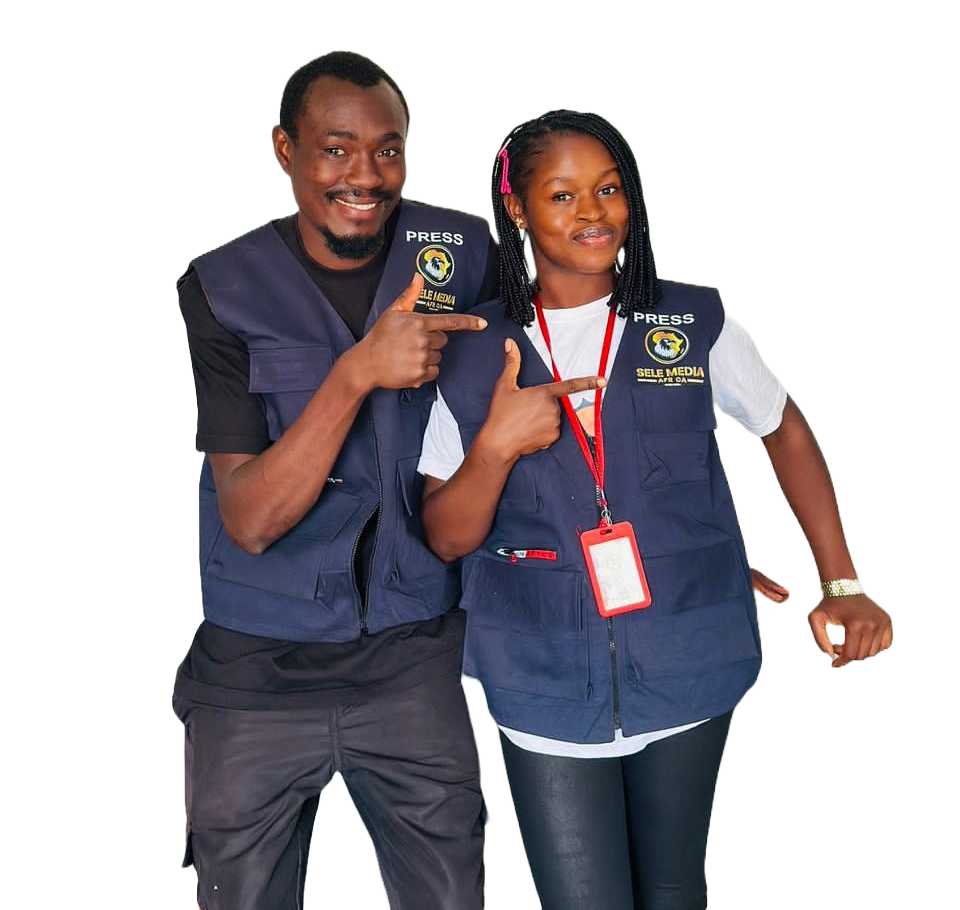 sele media africa team Two individuals wearing press vests.